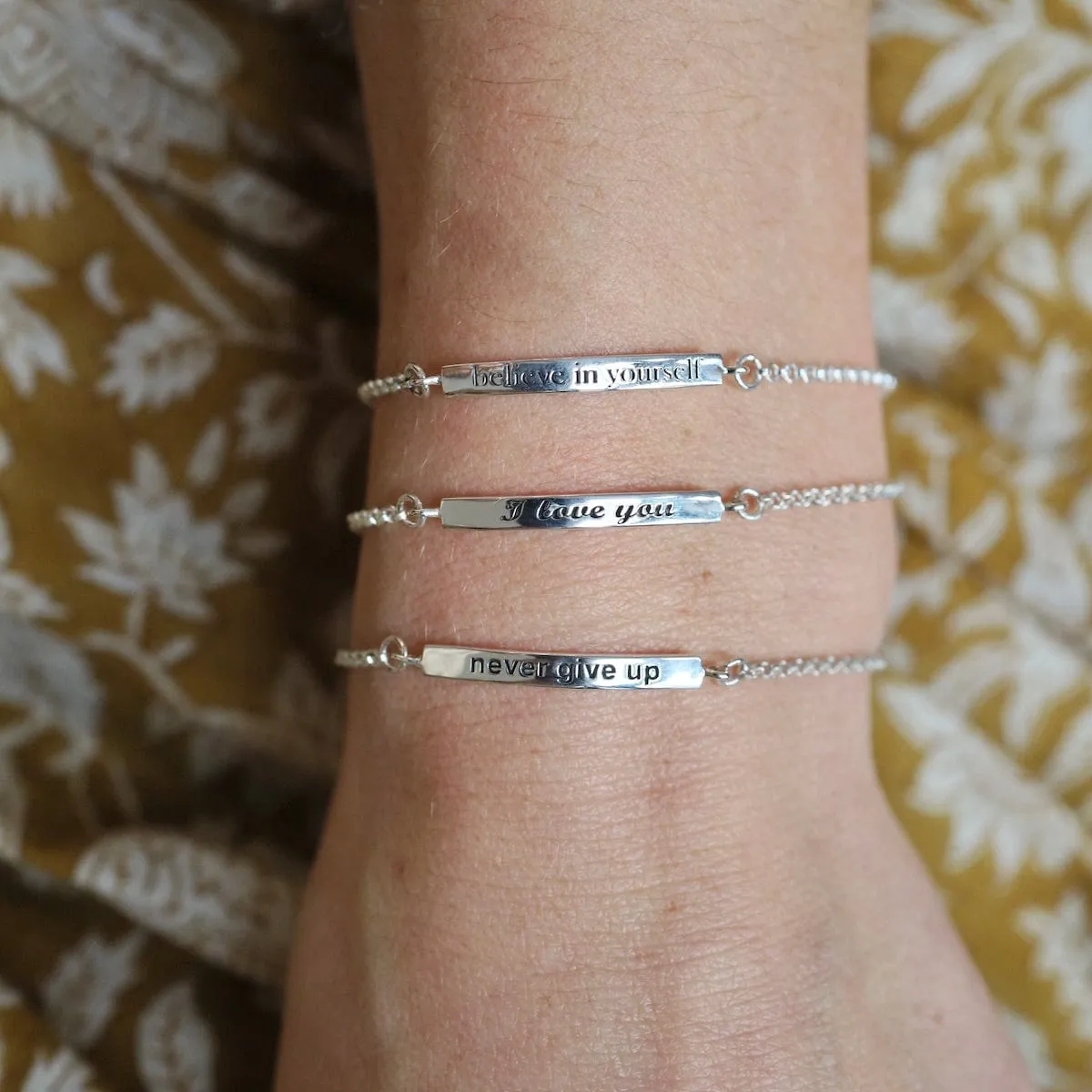 "Never Give Up" Silver ID Bar Bracelet