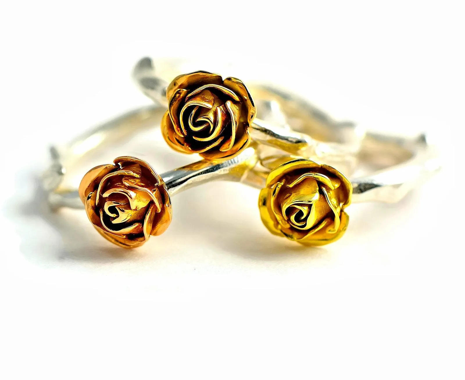 Yellow rose ring made in 9 carat yellow gold rose and soft rose stem band in silver