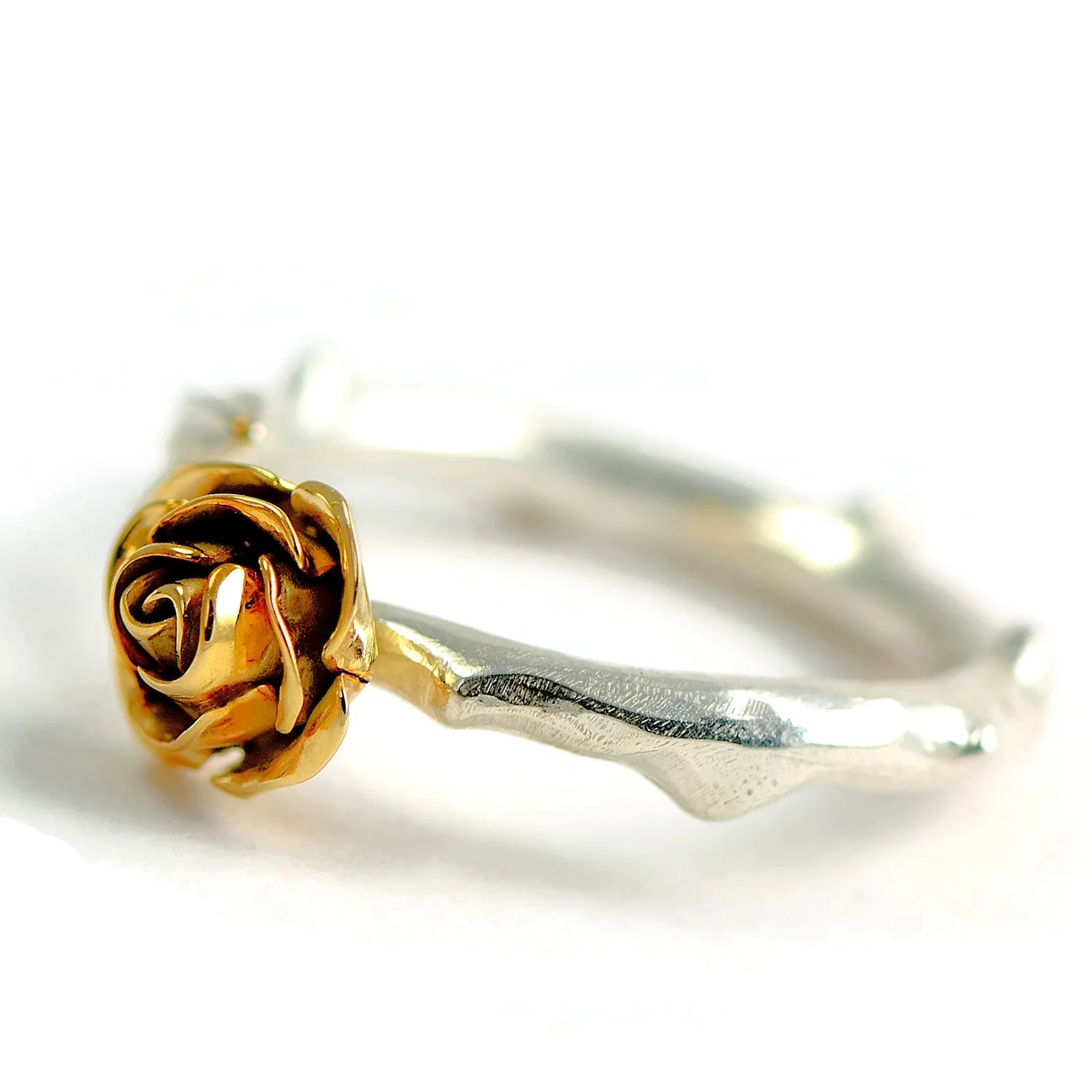 Yellow rose ring made in 9 carat yellow gold rose and soft rose stem band in silver