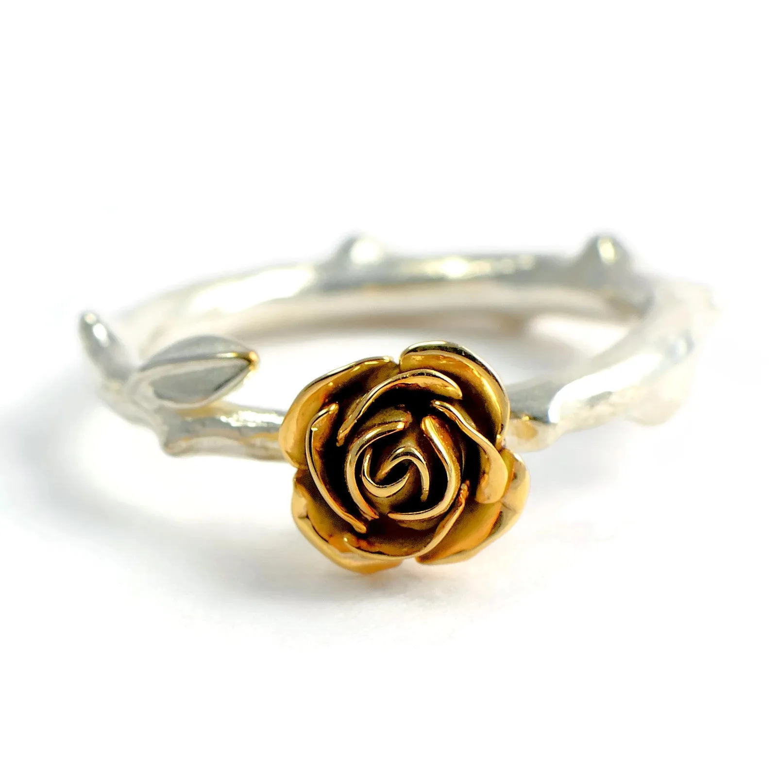 Yellow rose ring made in 9 carat yellow gold rose and soft rose stem band in silver