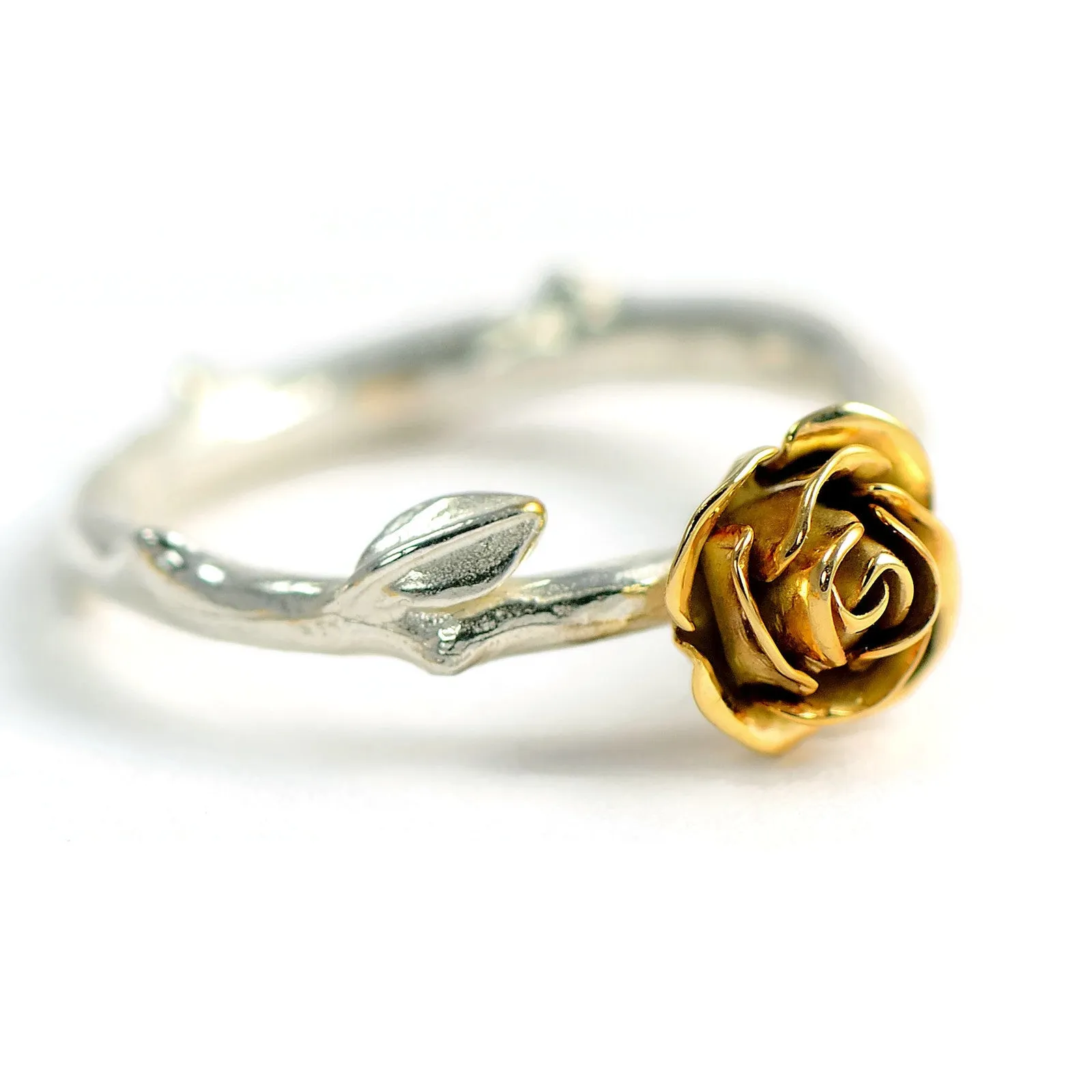 Yellow rose ring made in 9 carat yellow gold rose and soft rose stem band in silver