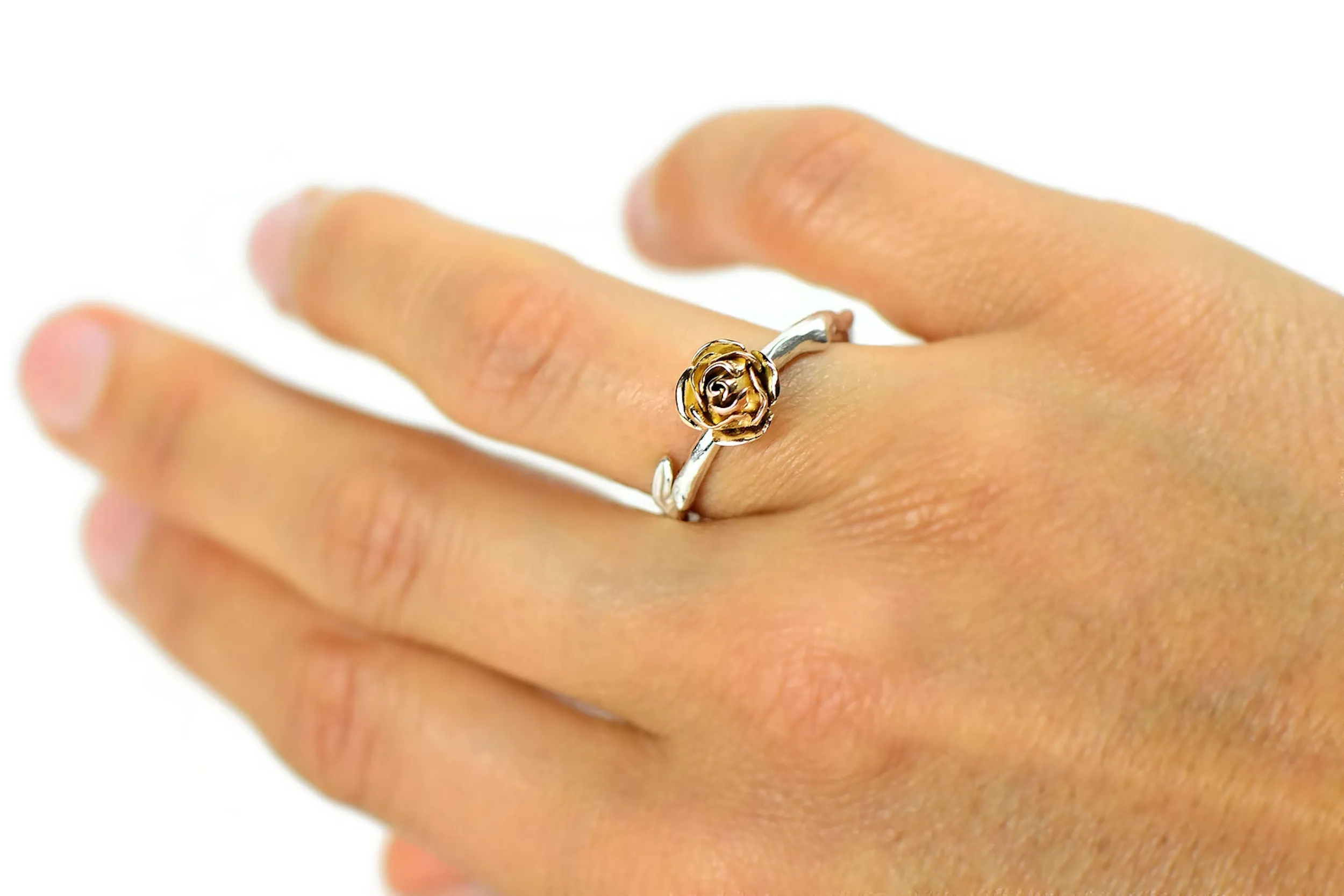 Yellow rose ring made in 9 carat yellow gold rose and soft rose stem band in silver